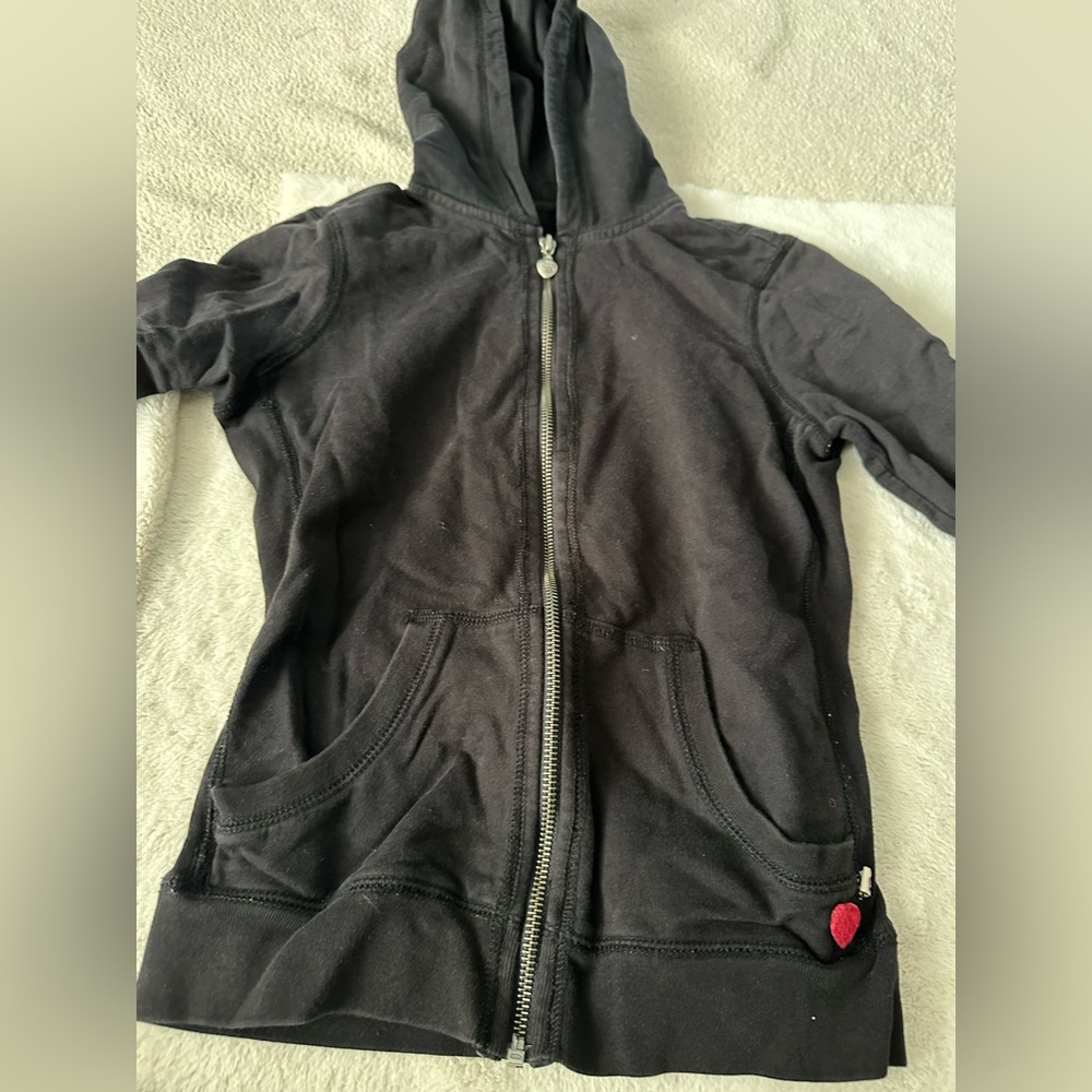 Twisted heart black hoodie with Swarovski crystal heart embellishment on back